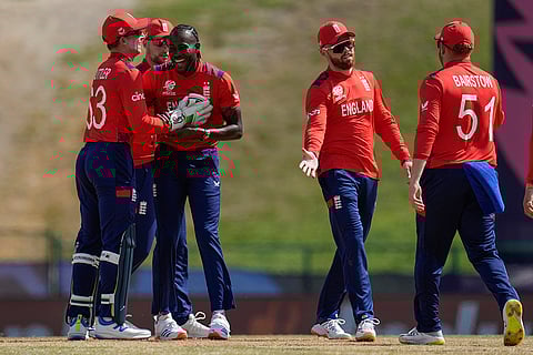 England players celebrate Pratik Athavale's wicket